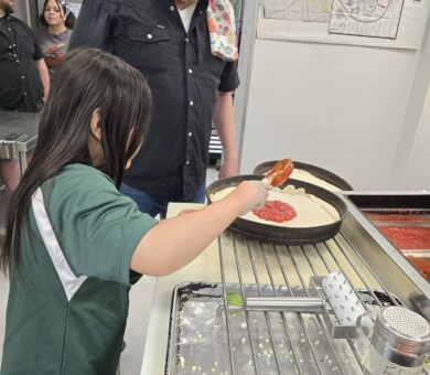 Avalanche Pizza visitor gets to help make pizza