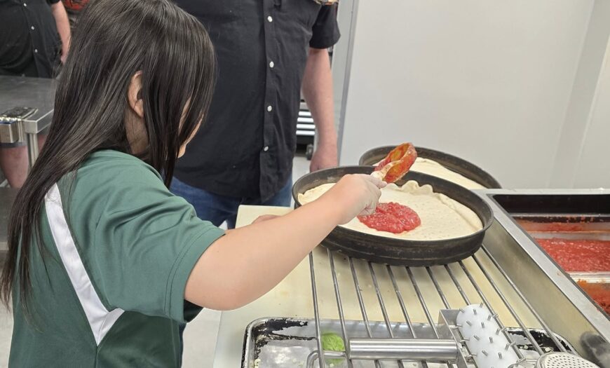Avalanche Pizza visitor gets to help make pizza