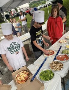 Junior Chef School kids make pizza